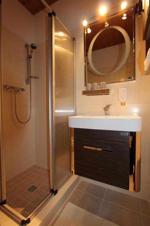 Koupelna v ubytování Hotel Lindwurm