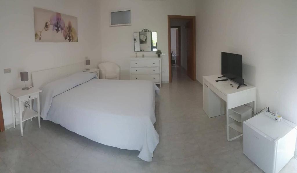 Katil atau katil-katil dalam bilik di Hotel Falco D'oro