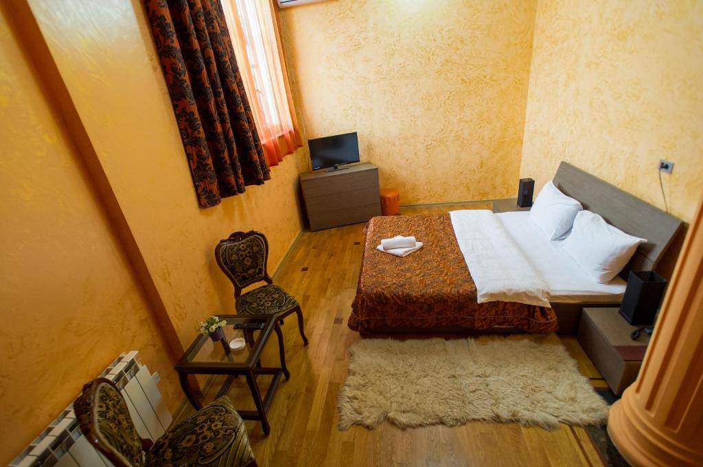 Postel nebo postele na pokoji v ubytování hotel amber