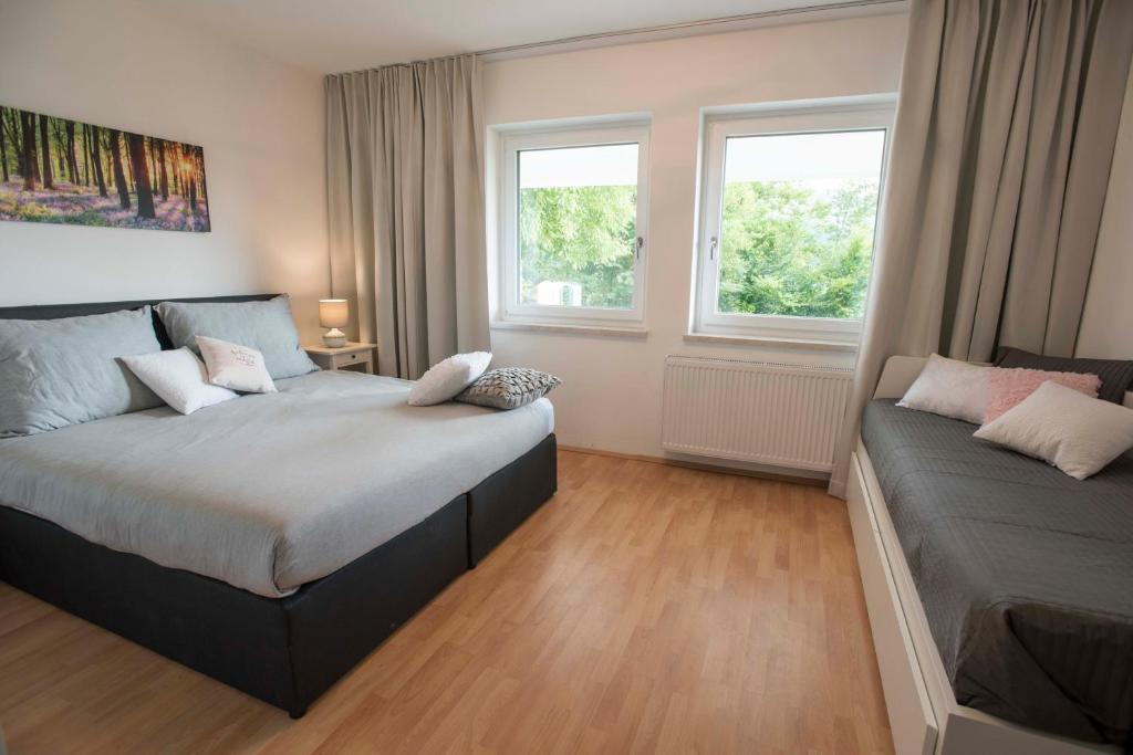 Postel nebo postele na pokoji v ubytování Lake View Apartments