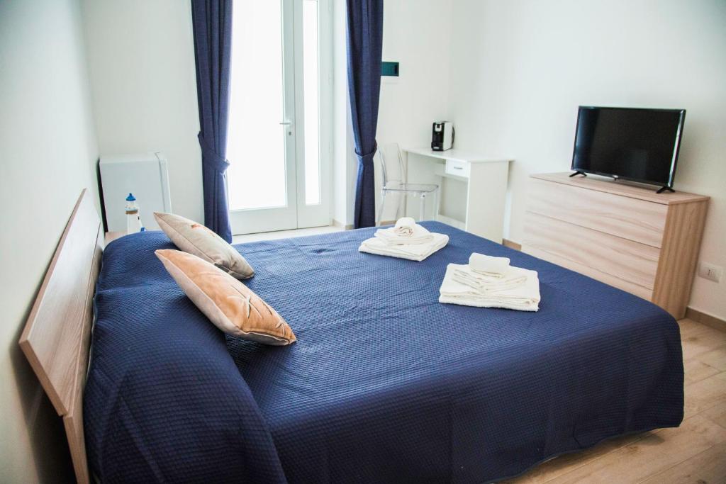 Posteľ alebo postele v izbe v ubytovaní Francesco B&B - Torre Canne