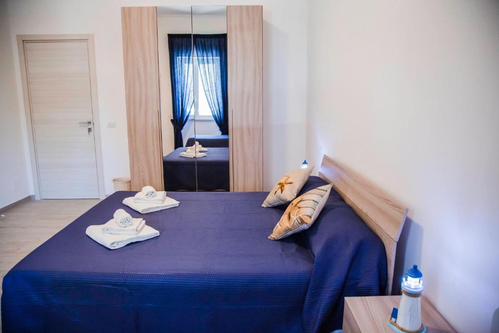 Posteľ alebo postele v izbe v ubytovaní Francesco B&B - Torre Canne