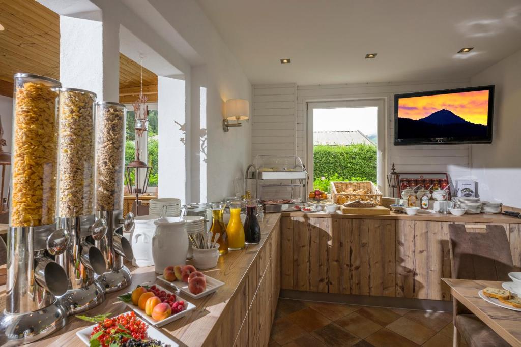 a kitchen with a counter with food on it at Haus Tirol in Brixen im Thale