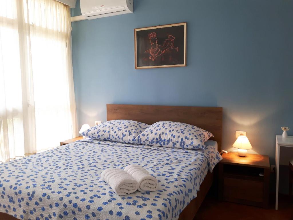 Posteľ alebo postele v izbe v ubytovaní Tajc Rooms
