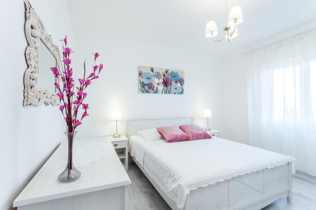 Voodi või voodid majutusasutuse Guest House Simoni toas