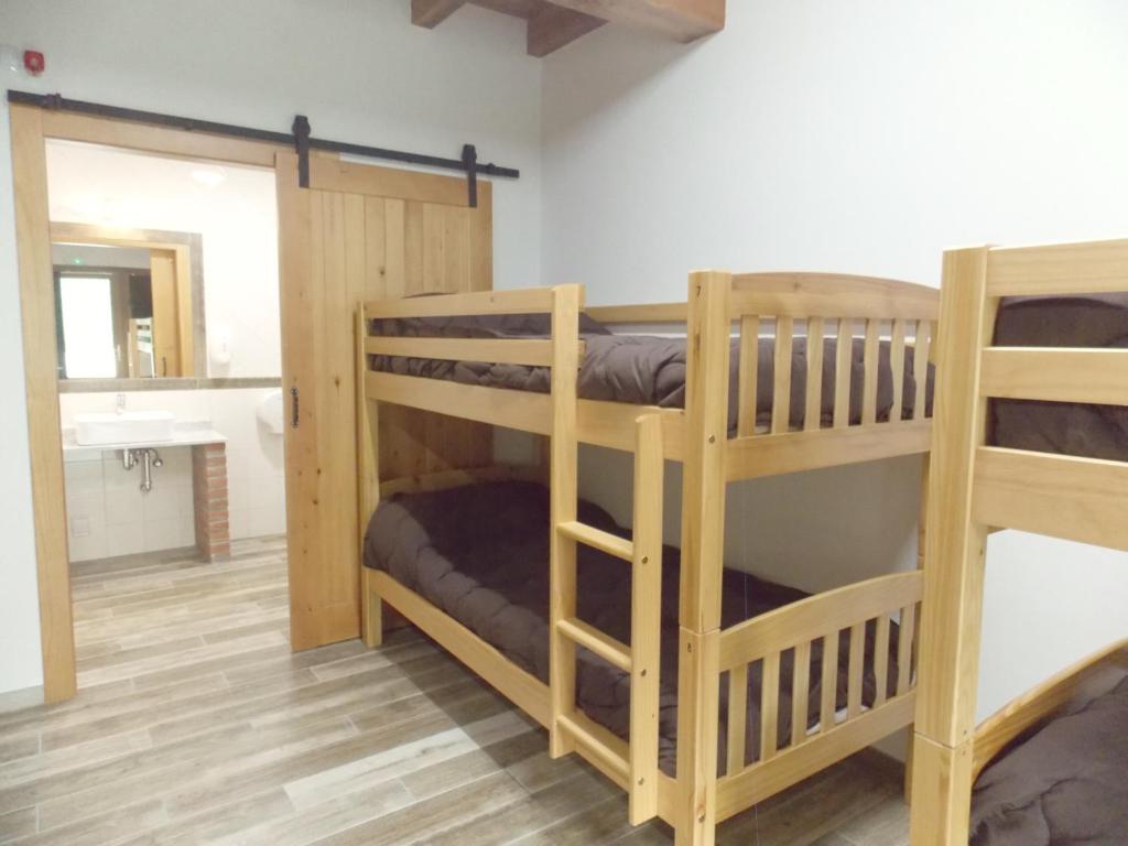 Postel nebo postele na pokoji v ubytování La Cala Hostel
