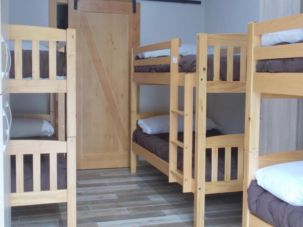 Postel nebo postele na pokoji v ubytování La Cala Hostel