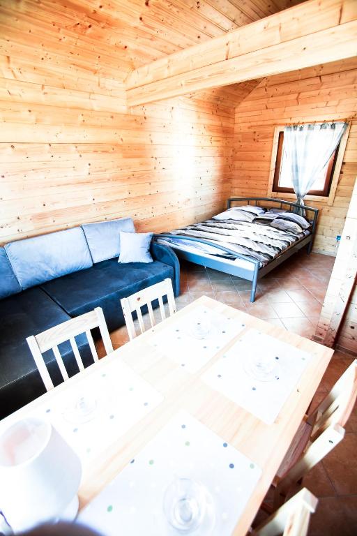 Postel nebo postele na pokoji v ubytování Domki Heaven Ustronie Morskie