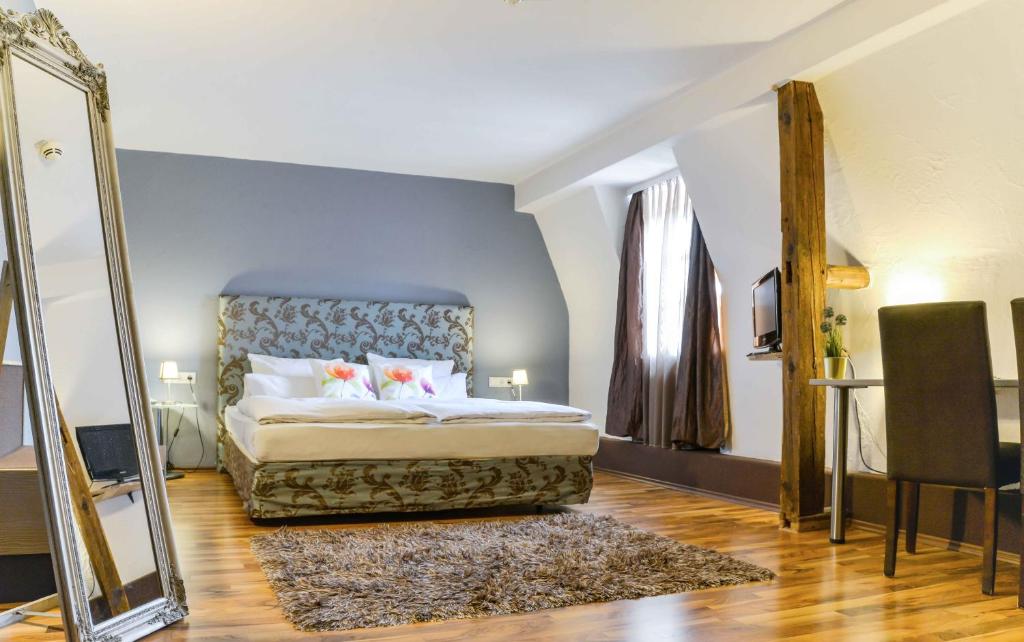 Ein Bett oder Betten in einem Zimmer der Unterkunft Hotel Engel