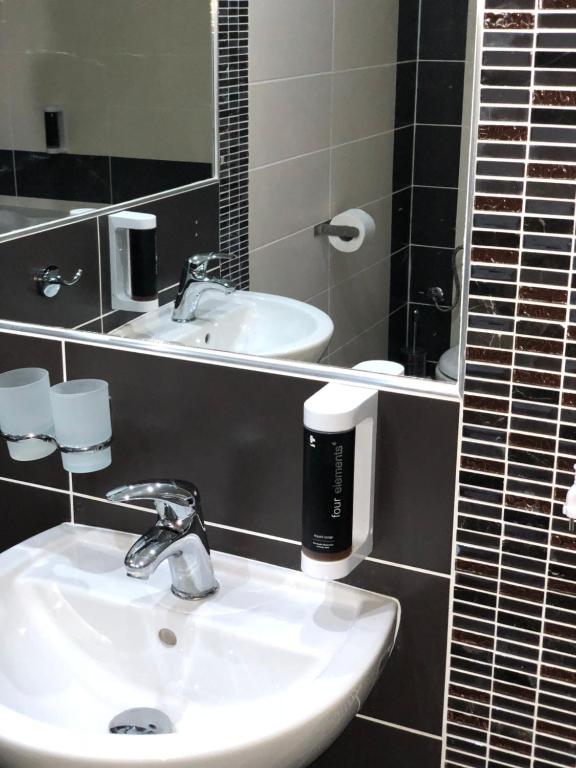 Koupelna v ubytování Hotel ELMA