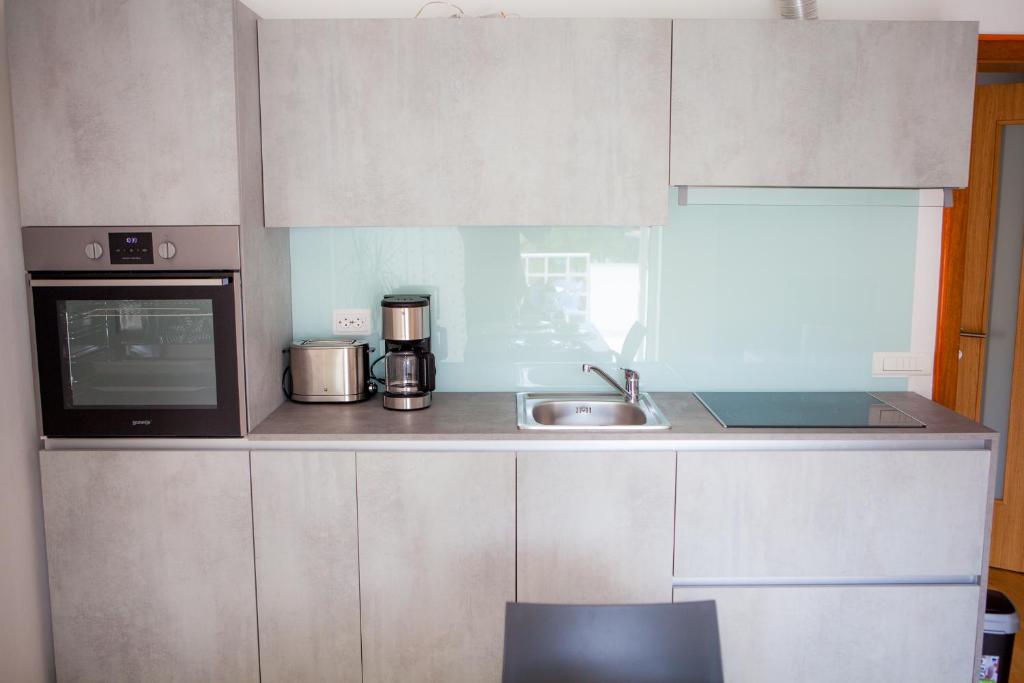 Kuchyňa alebo kuchynka v ubytovaní Apartment Lunta 2