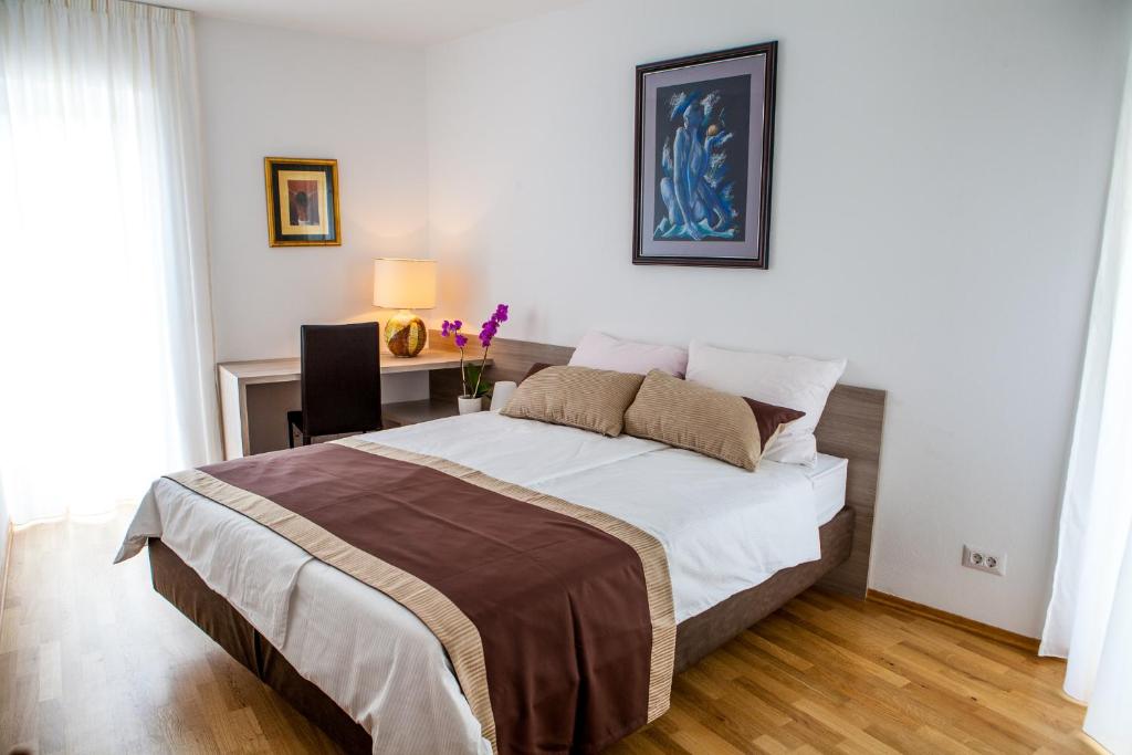 Posteľ alebo postele v izbe v ubytovaní Apartment Lunta 2