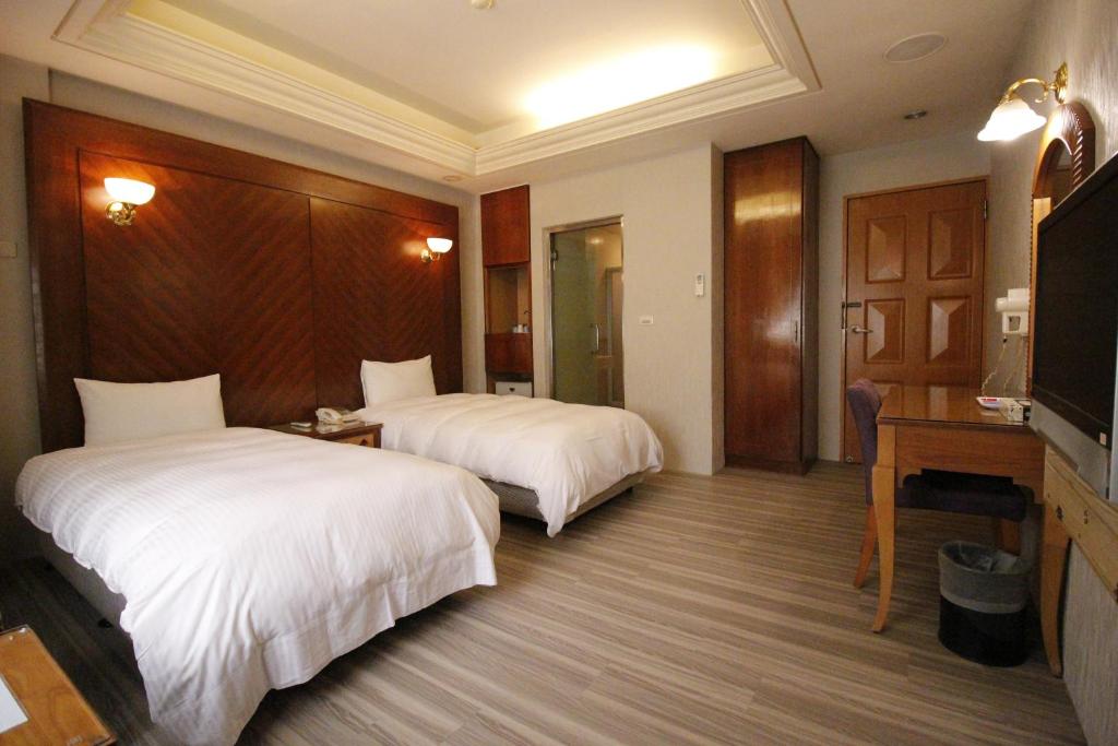 Postel nebo postele na pokoji v ubytování Spring City Motel