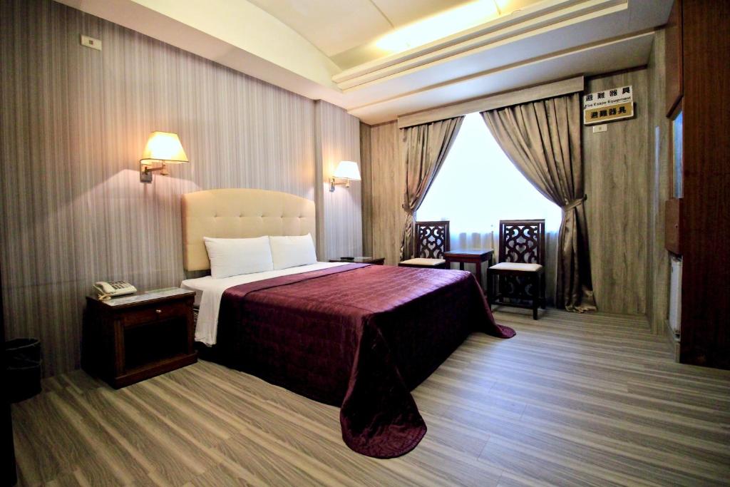 Postel nebo postele na pokoji v ubytování Spring City Motel