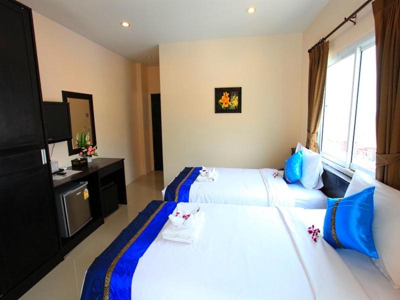 Postel nebo postele na pokoji v ubytování 88 Hotel