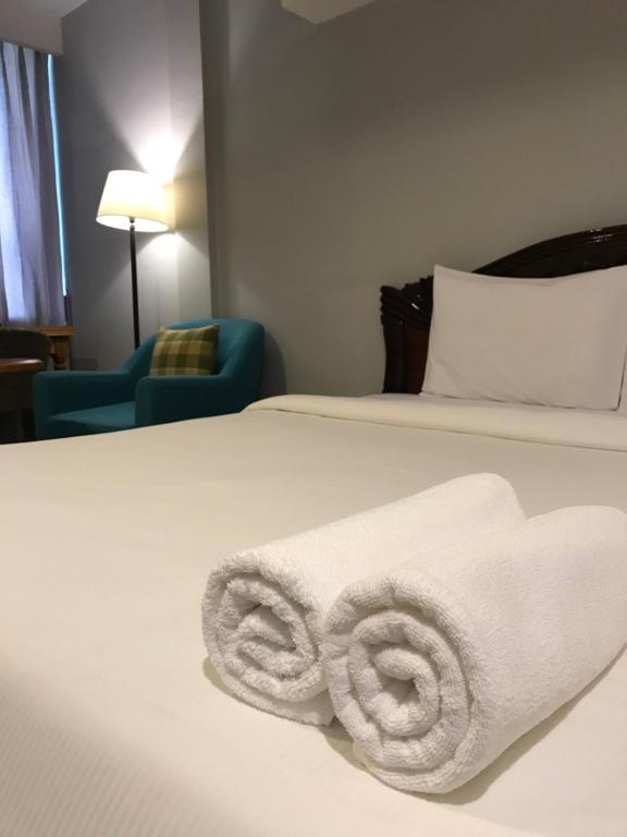 Postel nebo postele na pokoji v ubytování DoDo Guesthouse