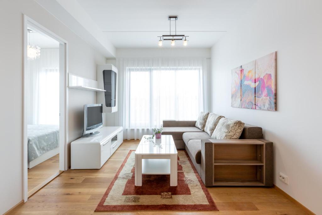 Posezení v ubytování Cosy city apartment