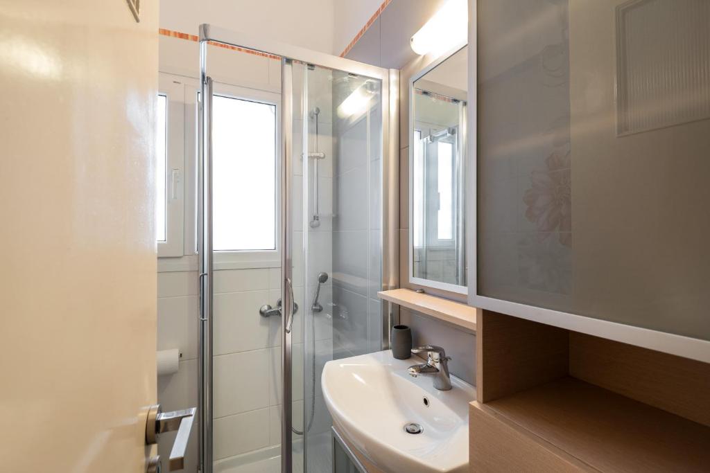 A bathroom at Acropolis Stylish Suite