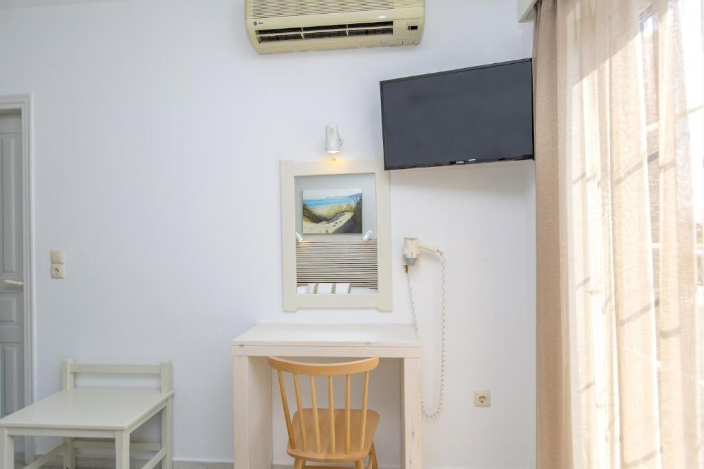 TV a/nebo společenská místnost v ubytování Hotel Semeli