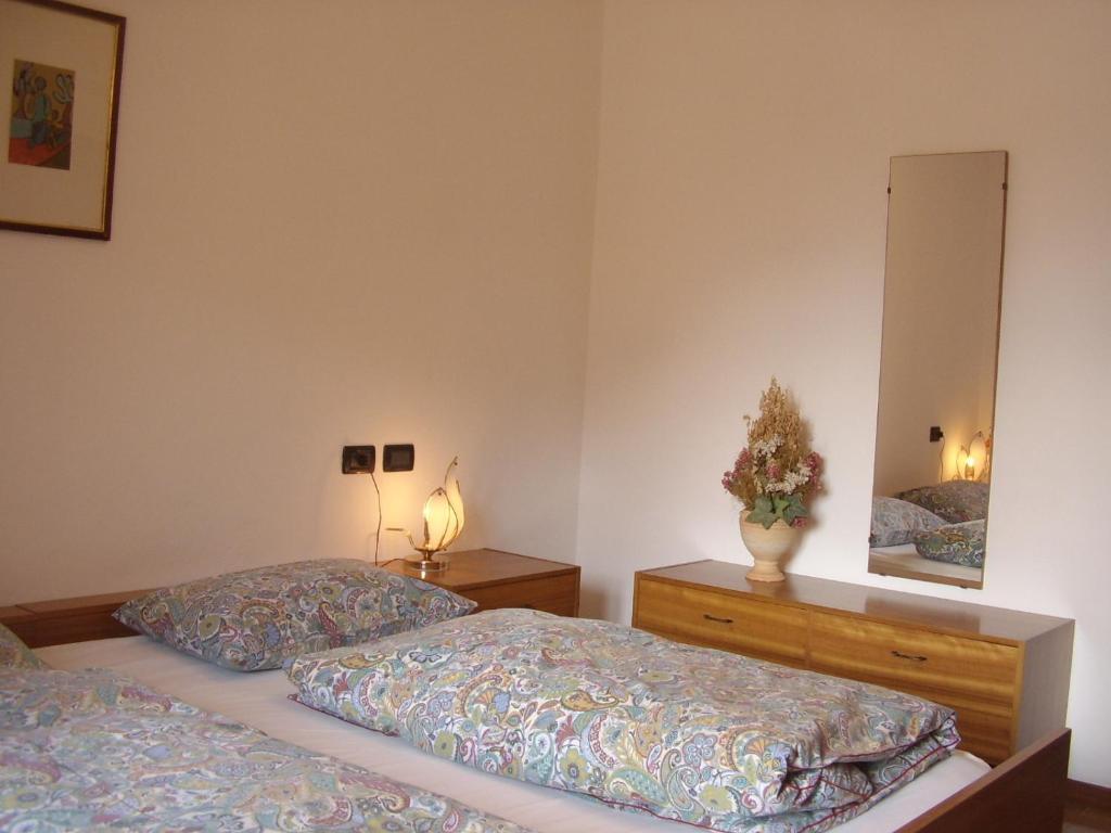 Postel nebo postele na pokoji v ubytování Casa Bruna Tignale