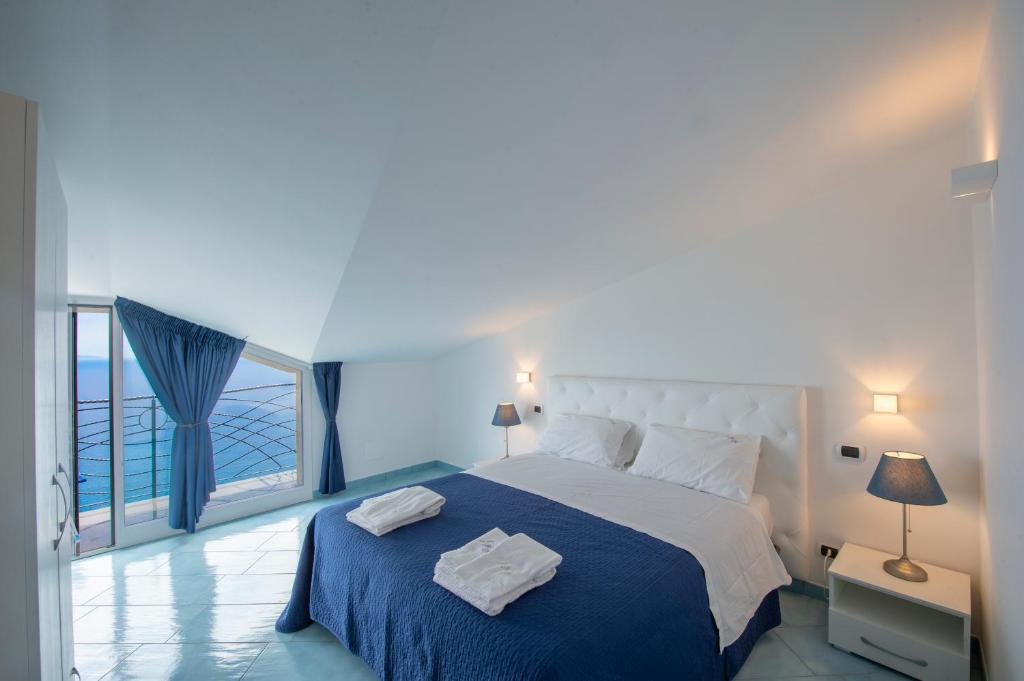 Posteľ alebo postele v izbe v ubytovaní amalfi coast mareblu