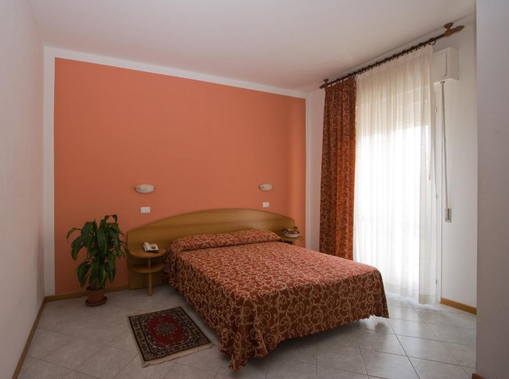 Postel nebo postele na pokoji v ubytování Hotel Bahama