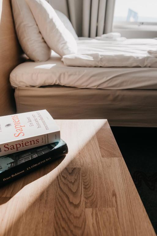 Postel nebo postele na pokoji v ubytování Tärnaby Fjällhotell