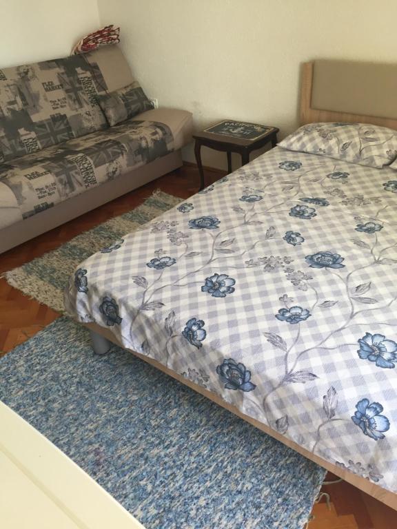 Postel nebo postele na pokoji v ubytování Tina Rooms