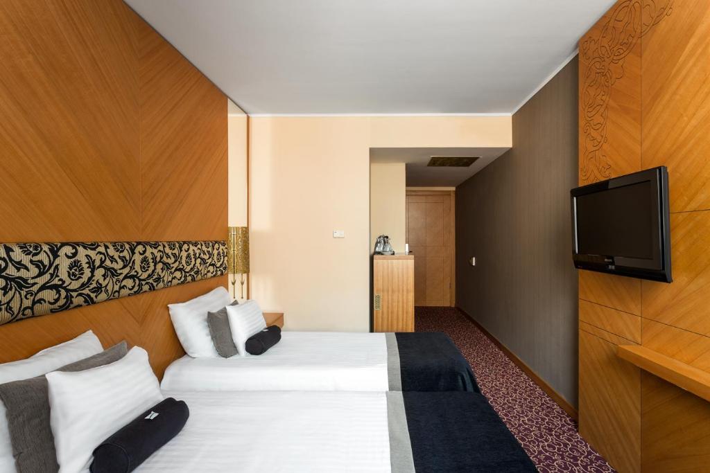 TV a/nebo společenská místnost v ubytování Marmara Hotel Budapest