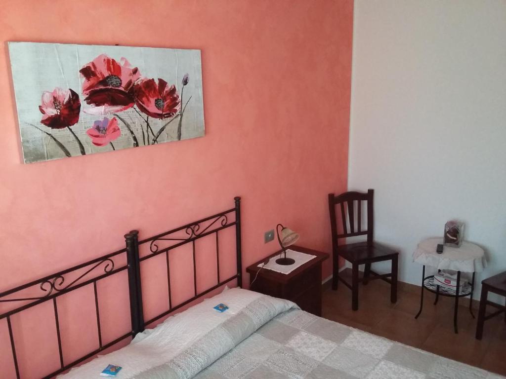 Postel nebo postele na pokoji v ubytování B&B Itufi
