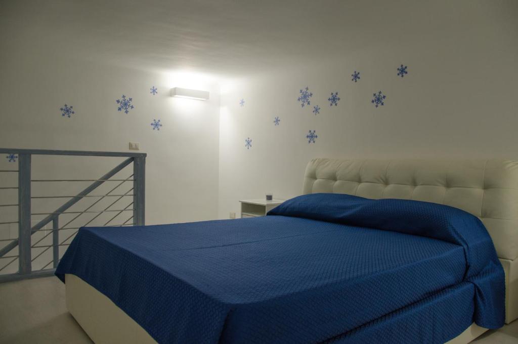 Postel nebo postele na pokoji v ubytování Le Stagioni