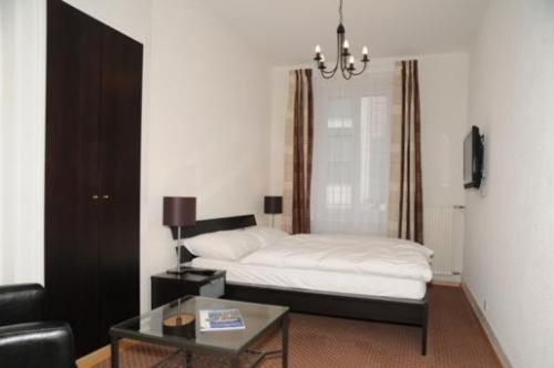 Postel nebo postele na pokoji v ubytování Hotel Splendid