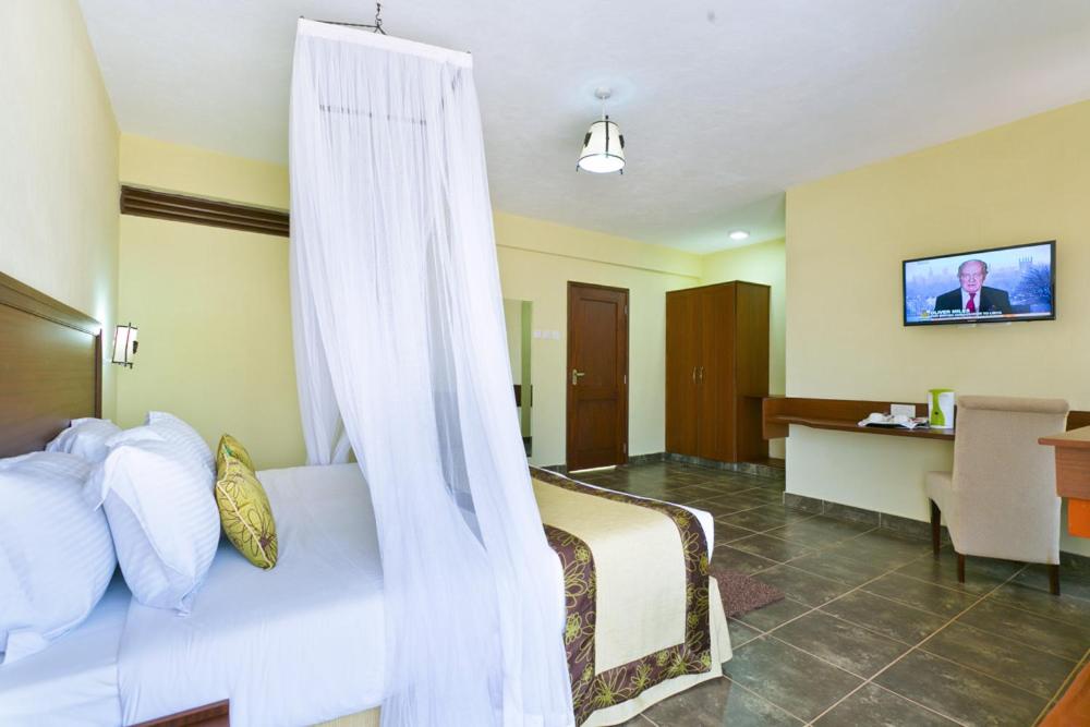 TV a/nebo společenská místnost v ubytování Sagana Getaway Resort