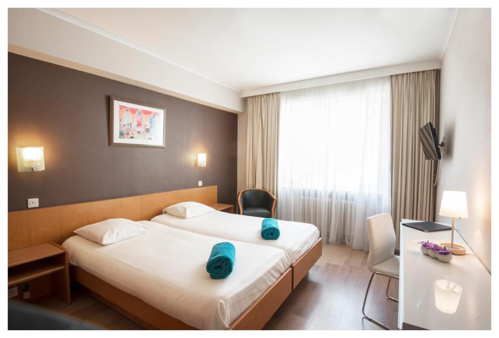 Postel nebo postele na pokoji v ubytování Hotel Ter Streep