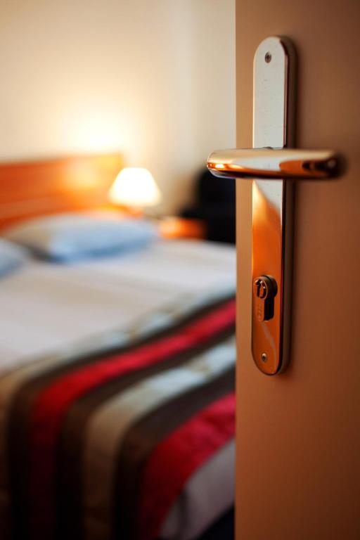 Postel nebo postele na pokoji v ubytování Hotel Creina