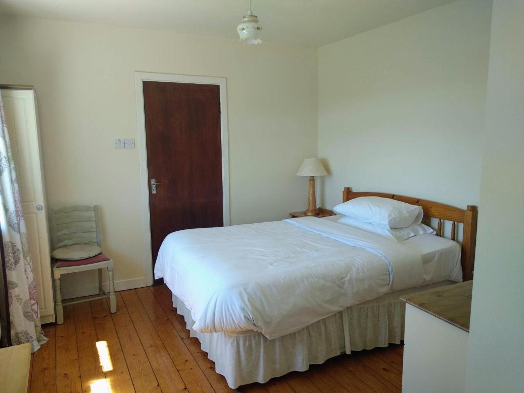 Postel nebo postele na pokoji v ubytování Seafield Farmhouse