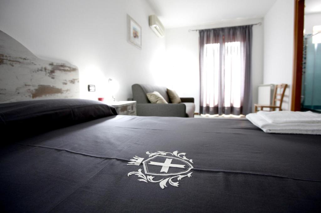 Postel nebo postele na pokoji v ubytování Luxury Room Vittorio Emanuele II