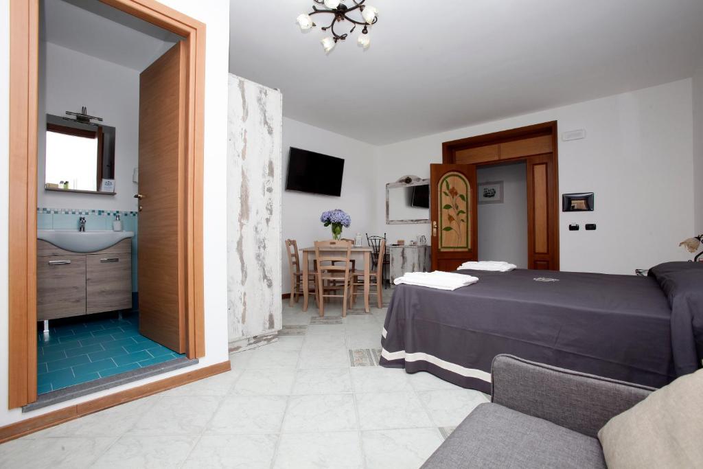 Postel nebo postele na pokoji v ubytování Luxury Room Vittorio Emanuele II