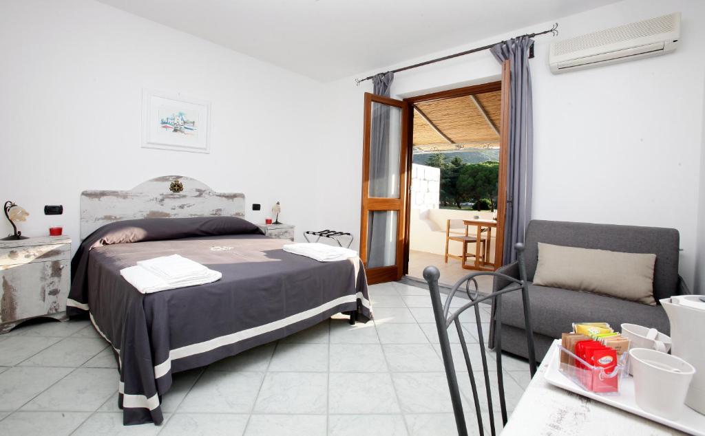 Postel nebo postele na pokoji v ubytování Luxury Room Vittorio Emanuele II
