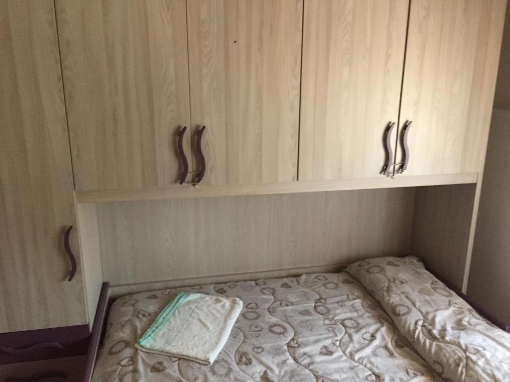Postel nebo postele na pokoji v ubytování Rudy Arenaile