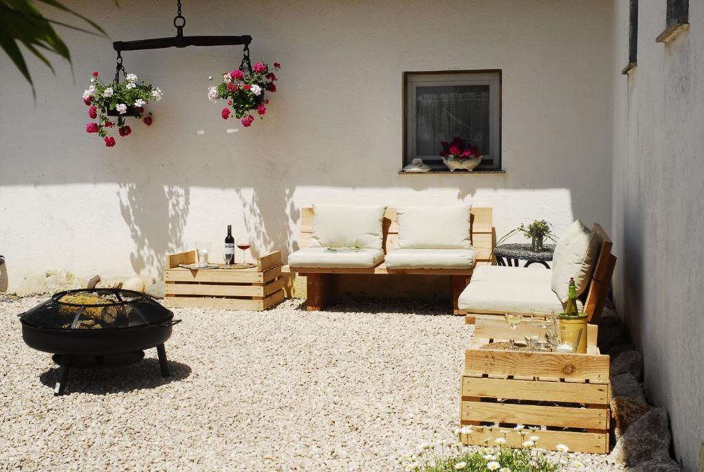 Posezení v ubytování Ferienwohnung Au Pajot