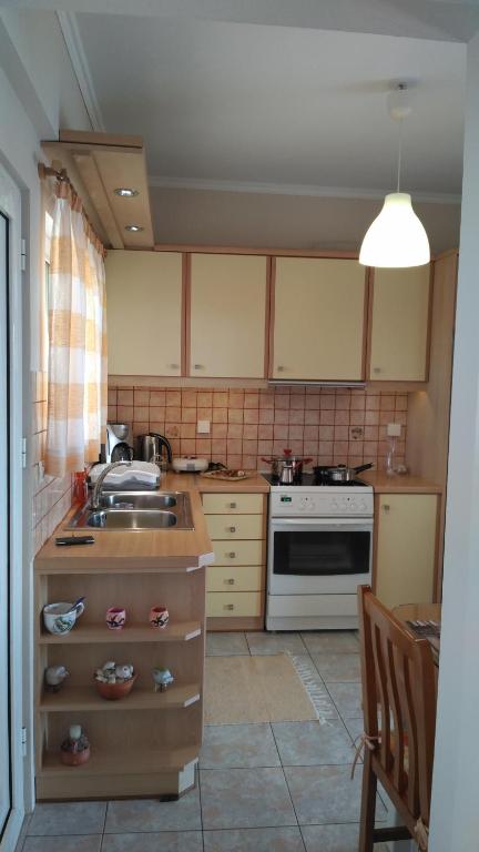 Kuchyňa alebo kuchynka v ubytovaní Port View Apartment