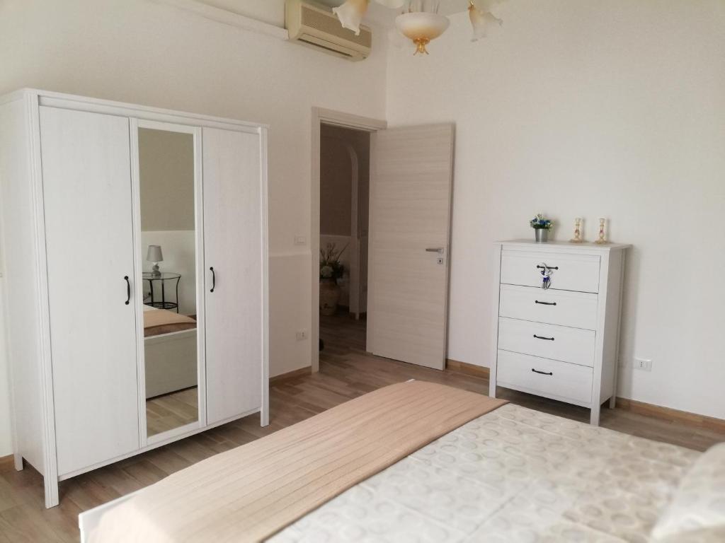 Postel nebo postele na pokoji v ubytování Casa Simo