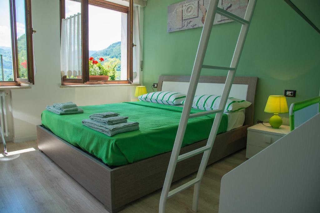 Postel nebo postele na pokoji v ubytování Casa Verde Belluno