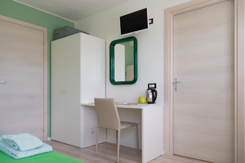 TV a/nebo společenská místnost v ubytování Casa Verde Belluno