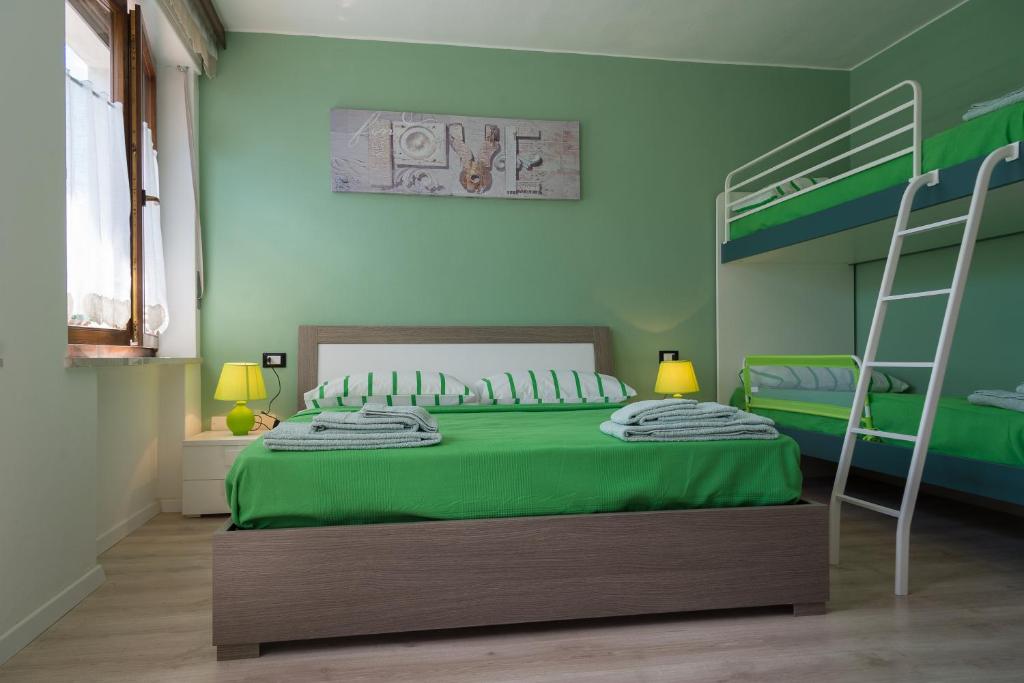 Postel nebo postele na pokoji v ubytování Casa Verde Belluno