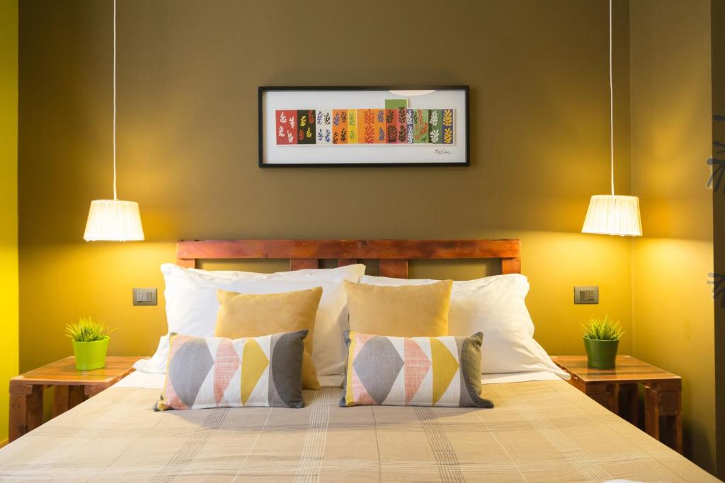 A bed or beds in a room at B&B Miro Centro Catania
