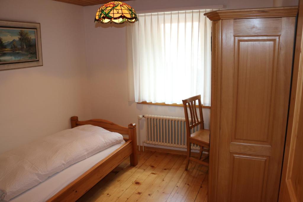 Postel nebo postele na pokoji v ubytování Hotel Lowen