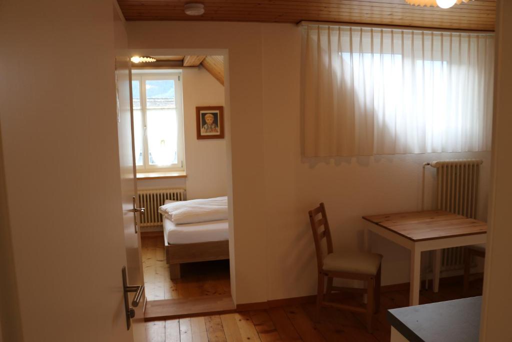 Postel nebo postele na pokoji v ubytování Hotel Lowen