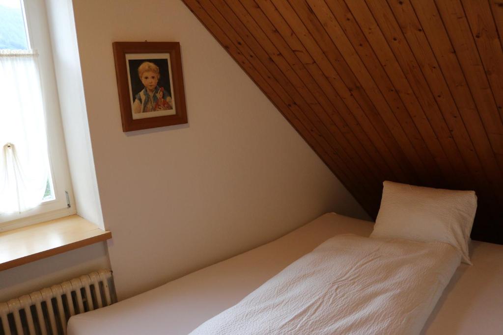 Postel nebo postele na pokoji v ubytování Hotel Lowen